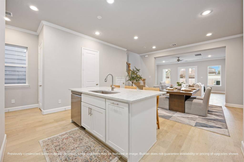 Whether you’re hosting a dinner party or a casual movie night, the open-concept flow keeps everyone connected from kitchen to couch.