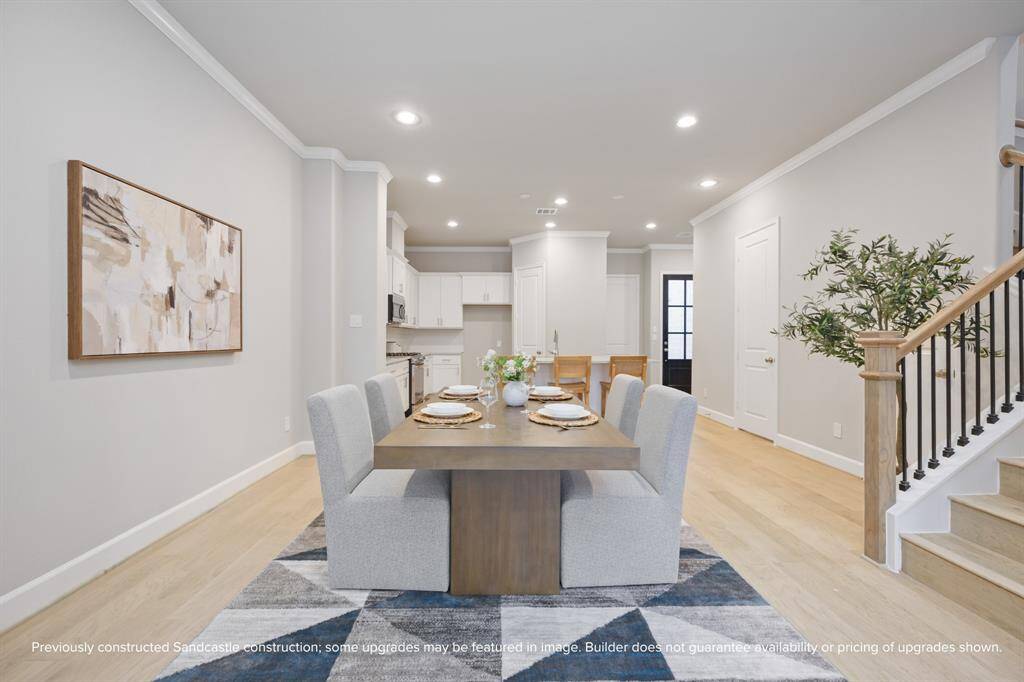 The dining space connects effortlessly to the kitchen, perfect for cozy weekday dinners or weekend entertaining. Selections by LYRD Interiors may differ from those shown.