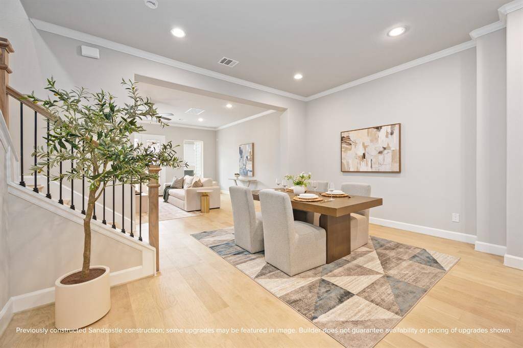 Flooded with natural light and designed for connection, this living and dining space balances openness with cozy charm.