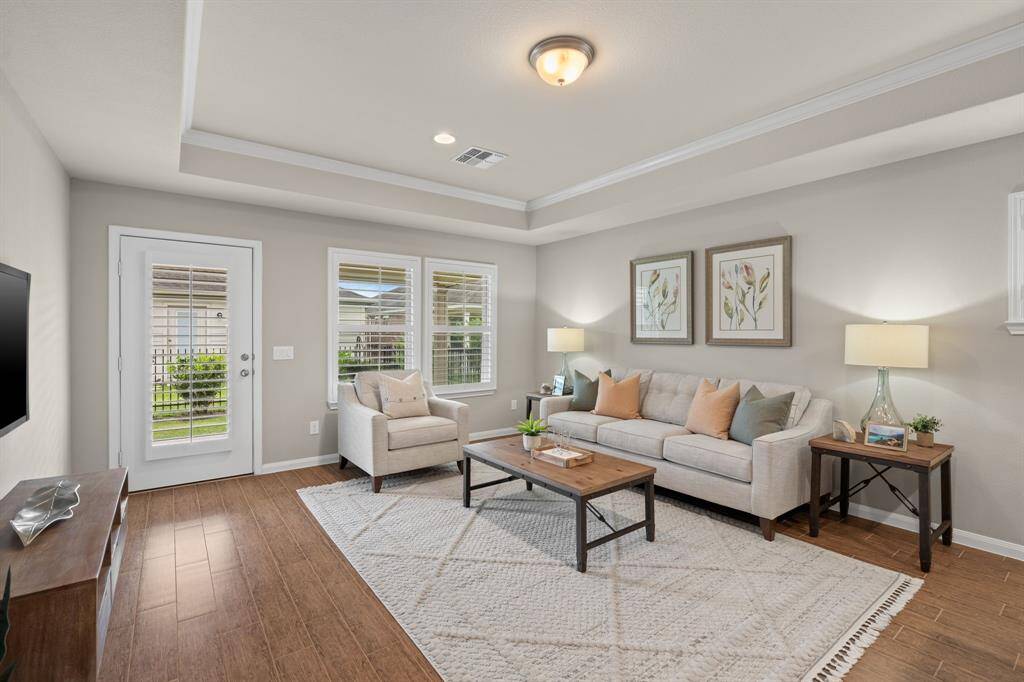 The natural light creates a comfortable & visually appealing space where you can relax, entertain, and enjoy family & friends.