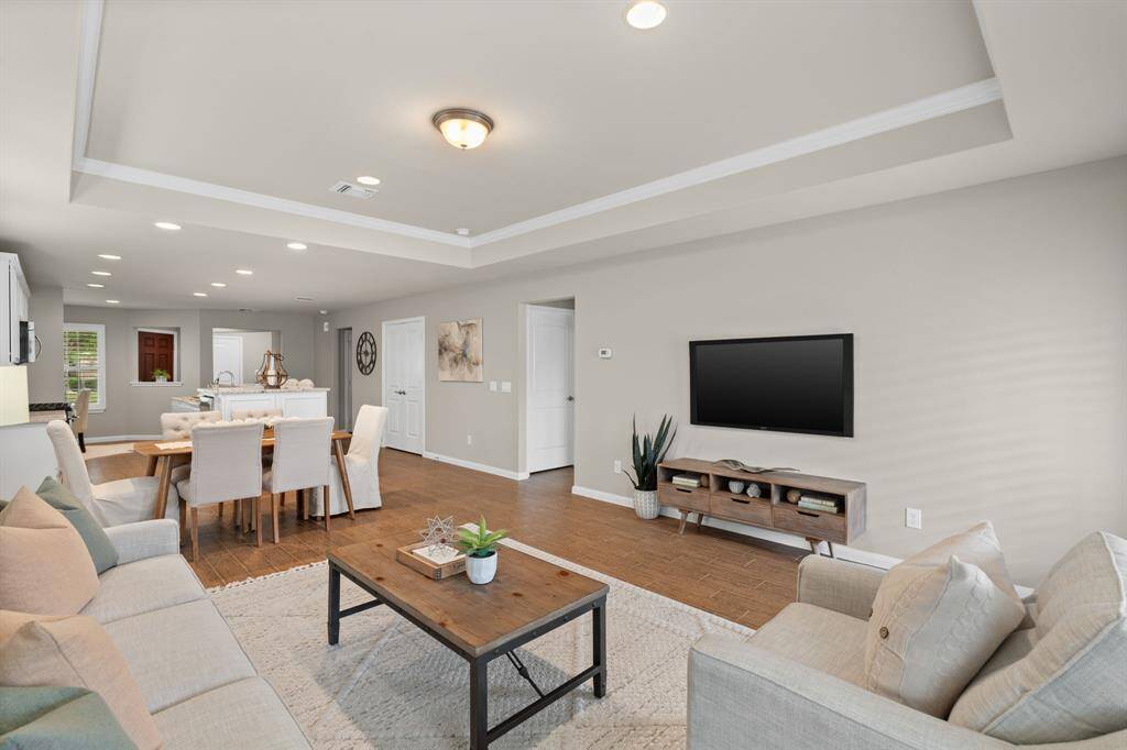 The Steel Creek design includes an open concept living area, combining the kitchen, dining and gathering room into one spacious and open space