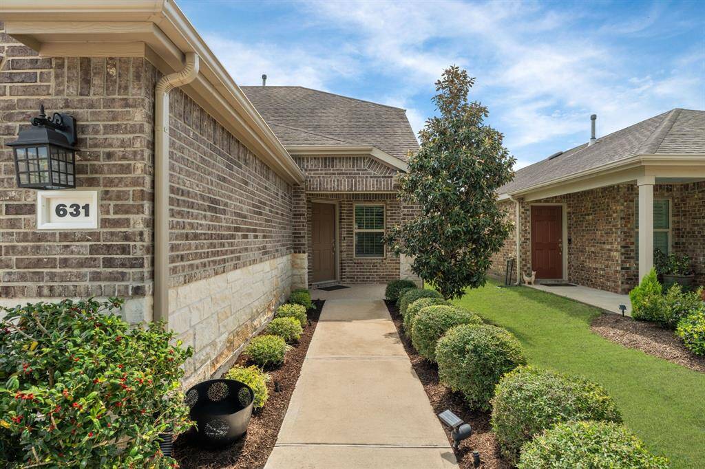 Follow the enchanting path lined with meticulously manicured landscaping and fresh hardwood mulch, leading to the inviting entryway of this charming Steel Creek home.
