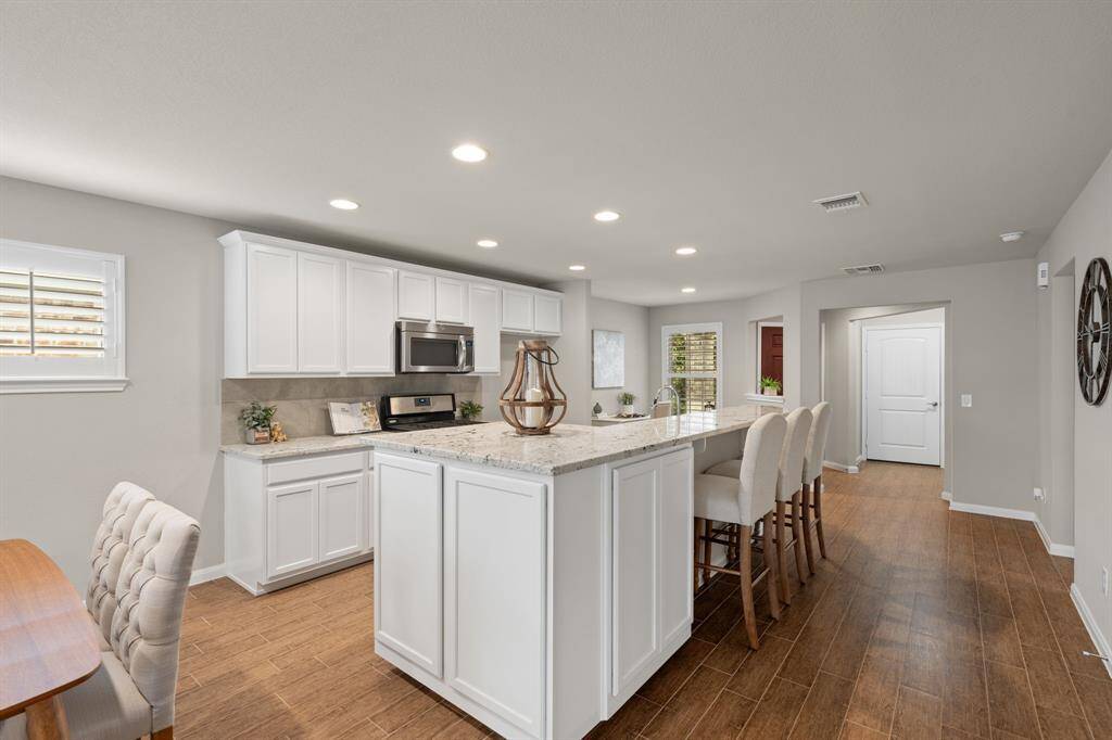 The gleaming Level 5 granite is one of the most stunning selections in the community—truly a showstopper.
