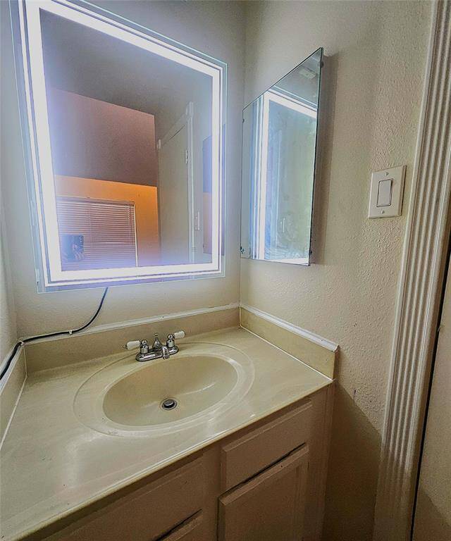 Secondary bathroom features a touch screen light-up mirror!