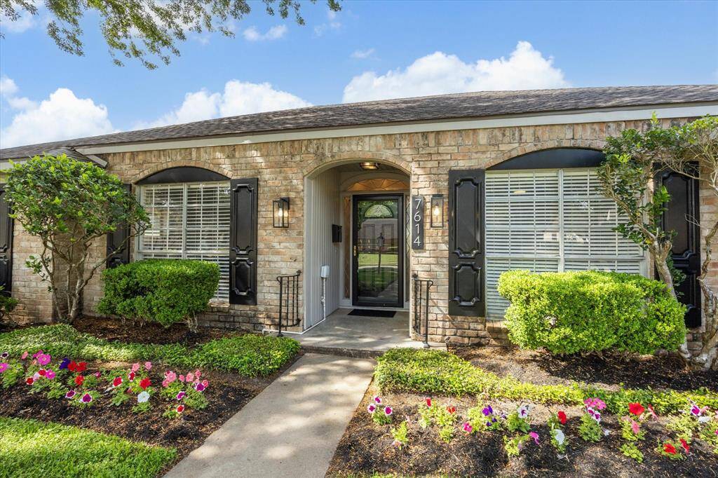 The owner's pride is reflected in the meticulously maintained landscaping of this home.