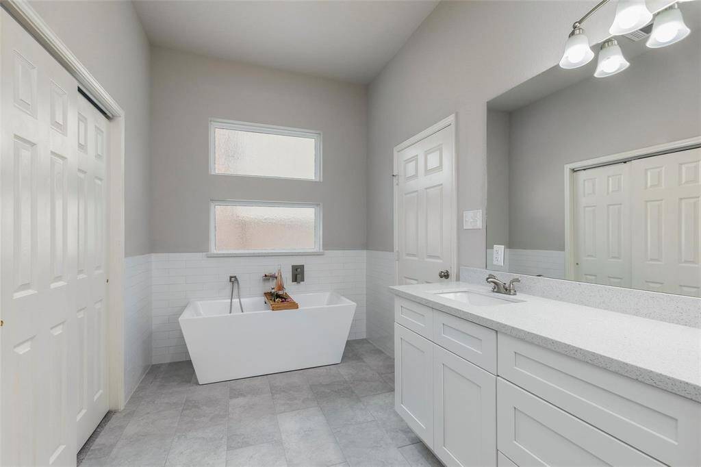 The sleek, sophisticated design creates a perfect balance of functionality and beauty, offering a space to unwind and refresh after a long day. The large, open layout is designed with relaxation in mind, featuring high-end finishes and ample space for comfort and convenience.