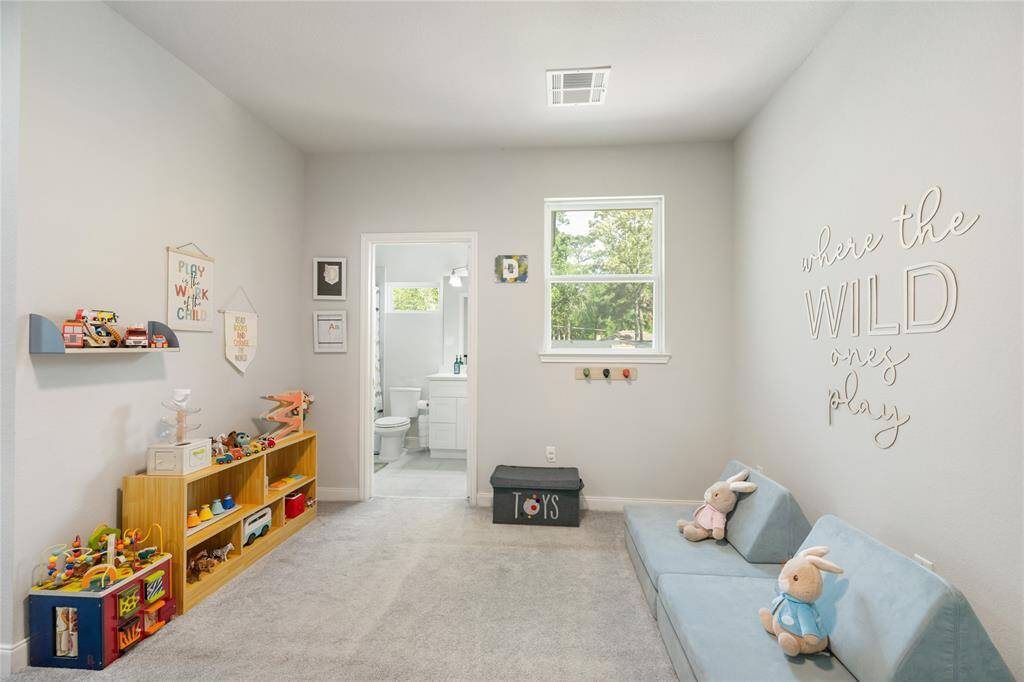 This versatile flex space offers soft carpeting, neutral tones, and built-in shelving—making it easy to envision as a playroom, media room, home office, or study area. With a nearby bathroom, it’s a flexible area ready to grow and adapt with your needs.
