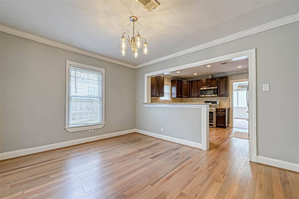 Separate dining area lookin into the kitchen.   Lots of area for a large table and extra side cabinets.