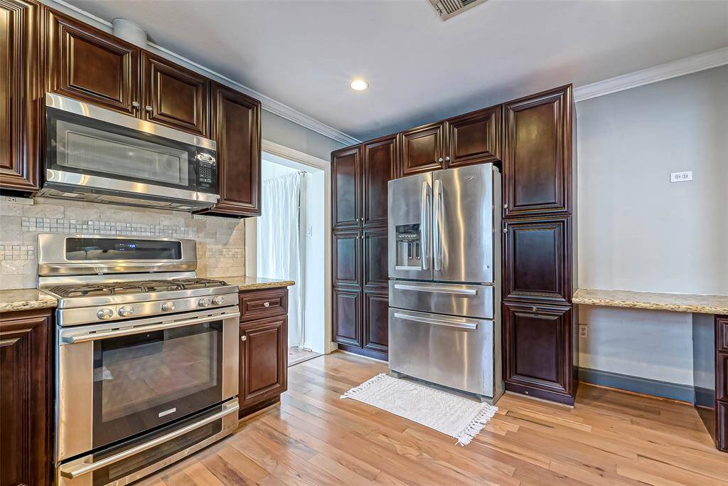 Loads of cabinets and large oven.