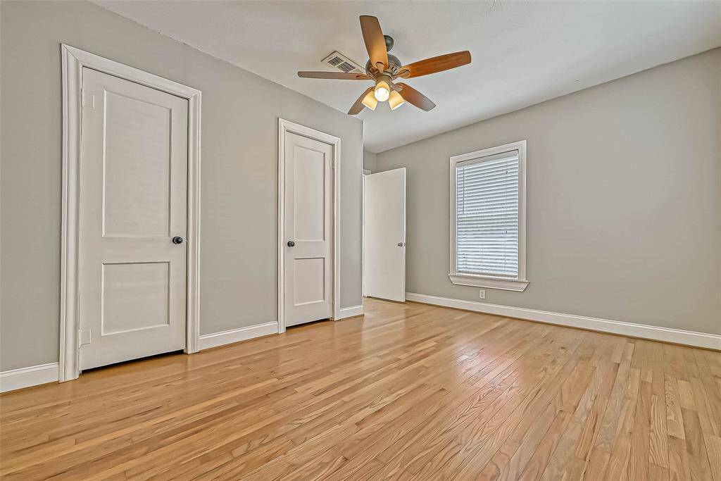 Window in third bedroom looks into the backyard.