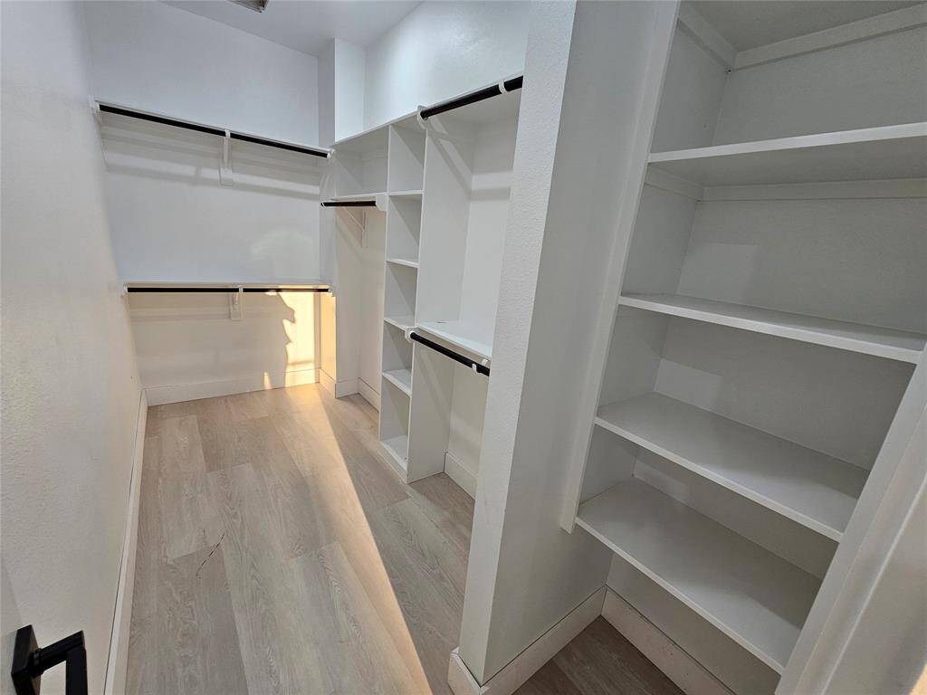 Second primary suite custom closet.