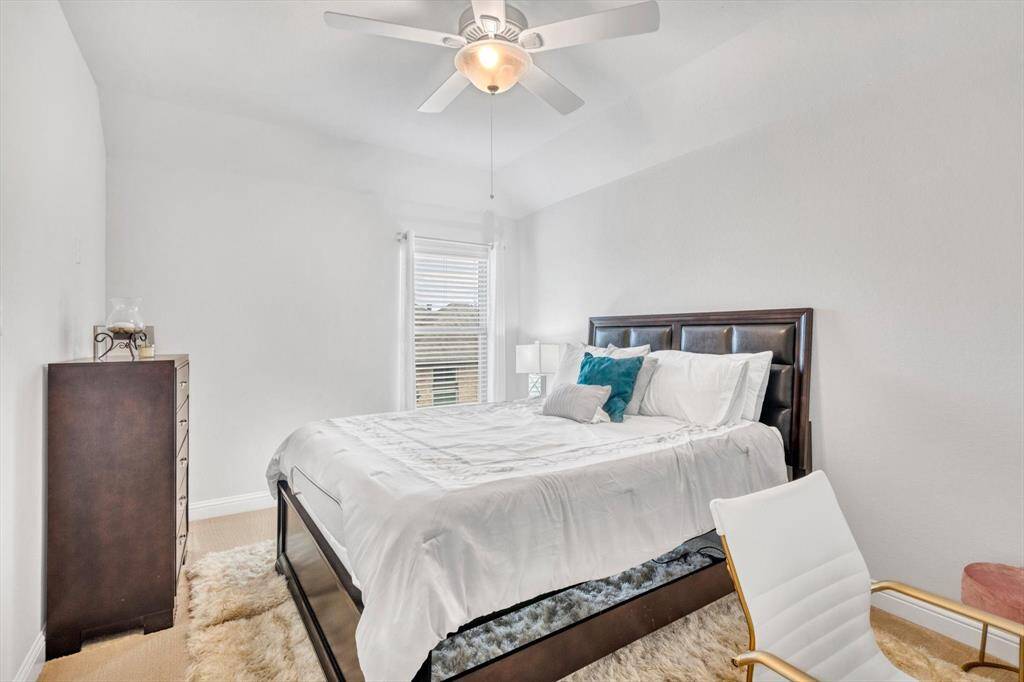 4th bedroom with carpet.