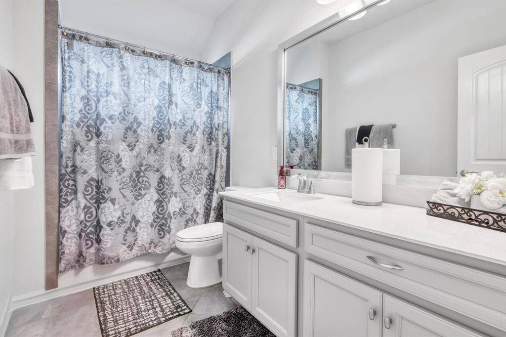3rd bathroom, with shower over tub.