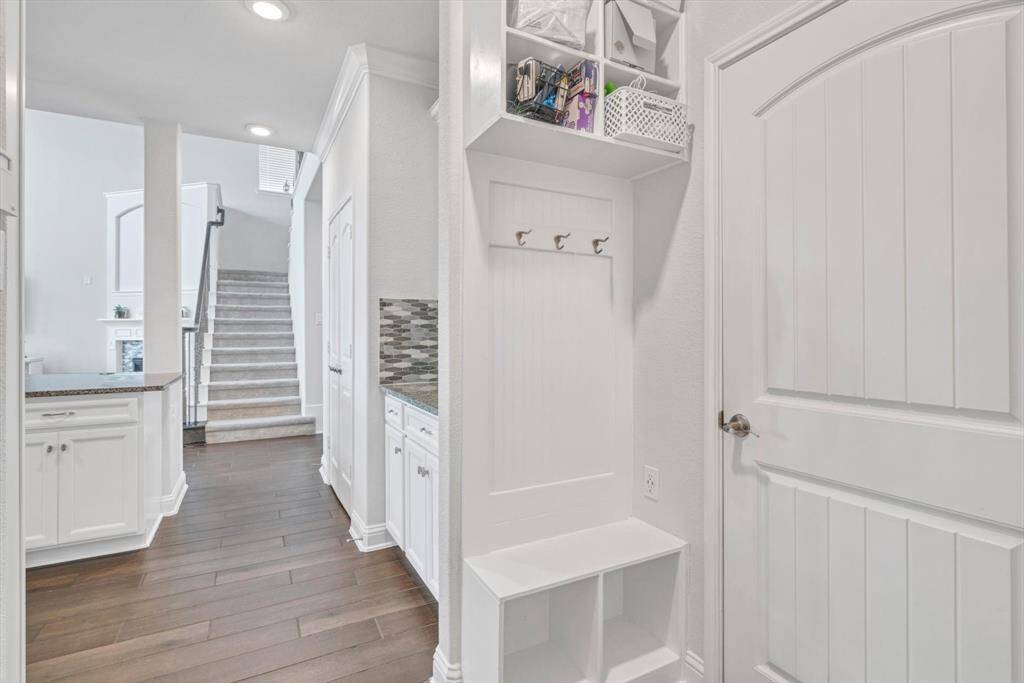 MUD room, door leading to garage.