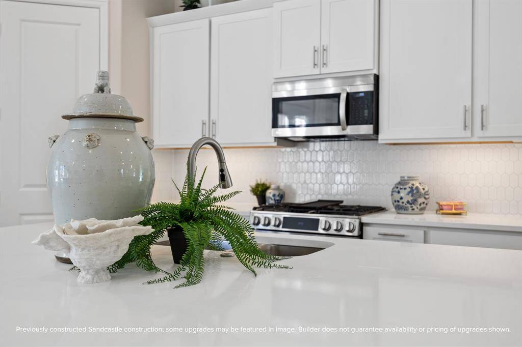 Where simple moments shine—whether it’s sunrise coffee or a quiet evening chat, the island is always the heart of it all. Curated finishes by LYRD Interiors add timeless appeal.
