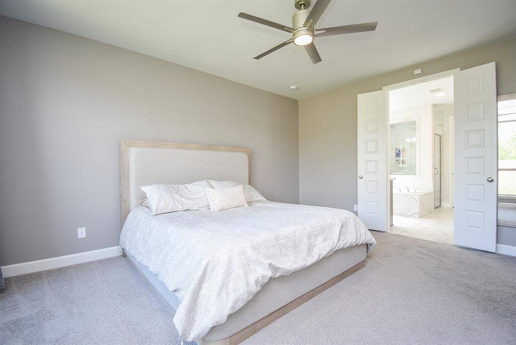 Sophisticated 1st Floor Primary suite. Double door entry to Primary Bath