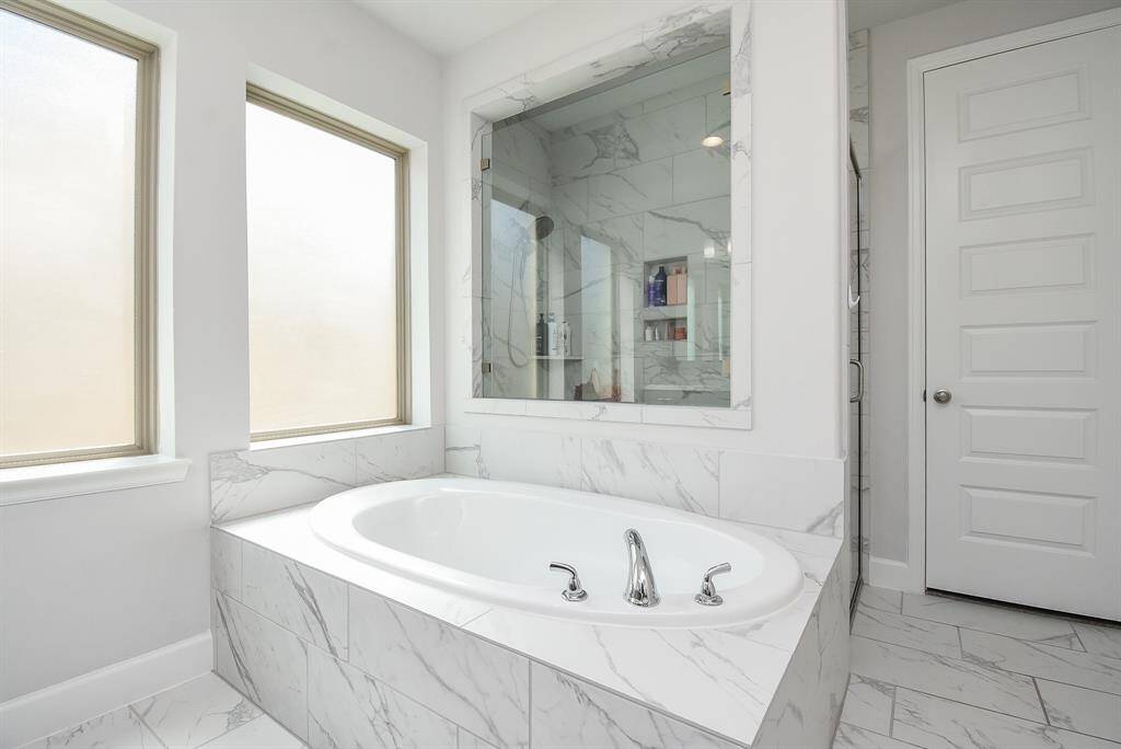 Separate tub and glass shower in Primary bath