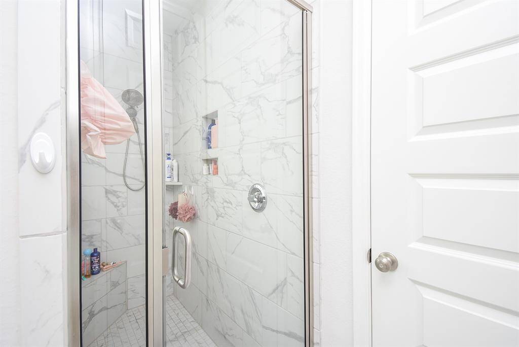 Large all white glass shower in Primary bath