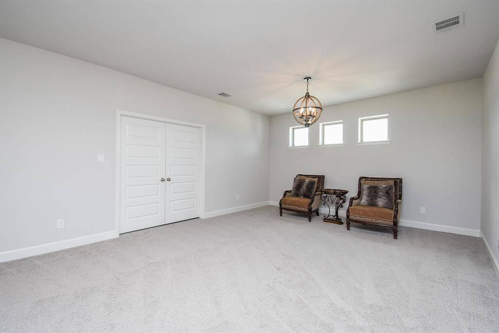 Upstairs media room to enjoy movie night with the family.