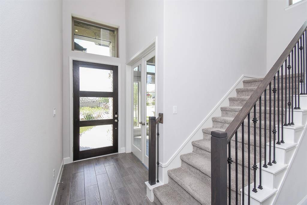 Entryway open to the living area jus passed the study.