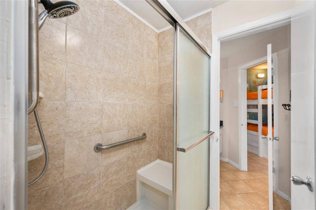 Nicely tiled shower.