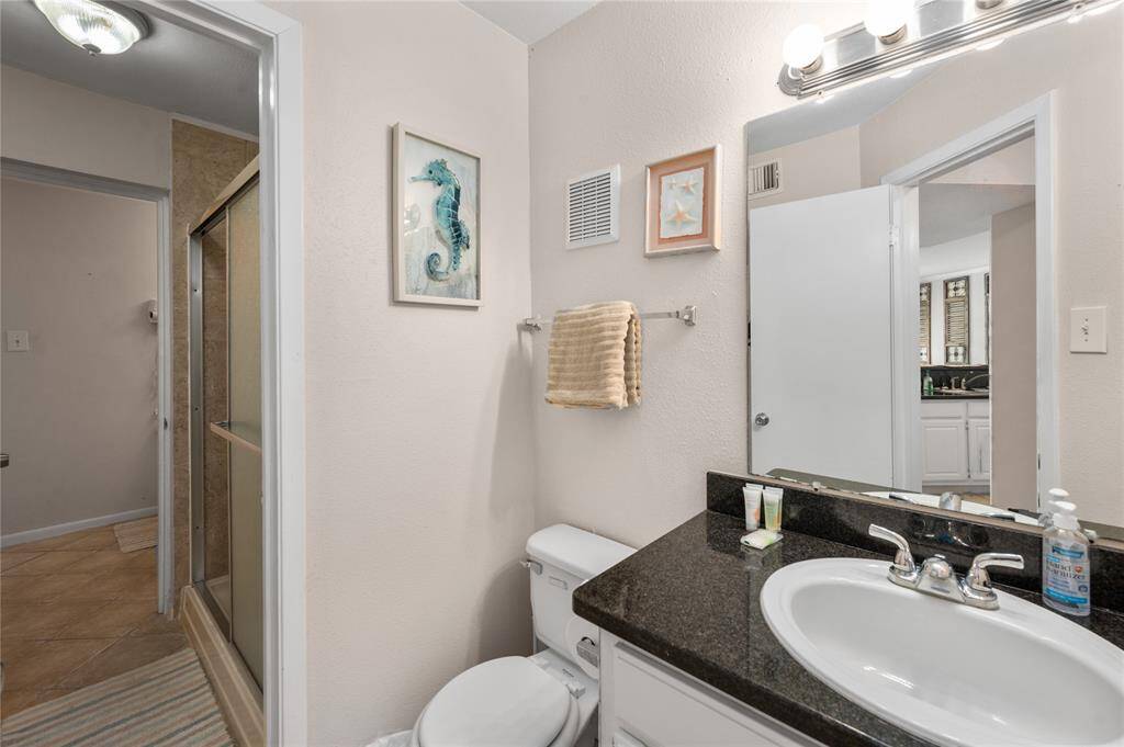 Half bath near bunks and guest bedroom.