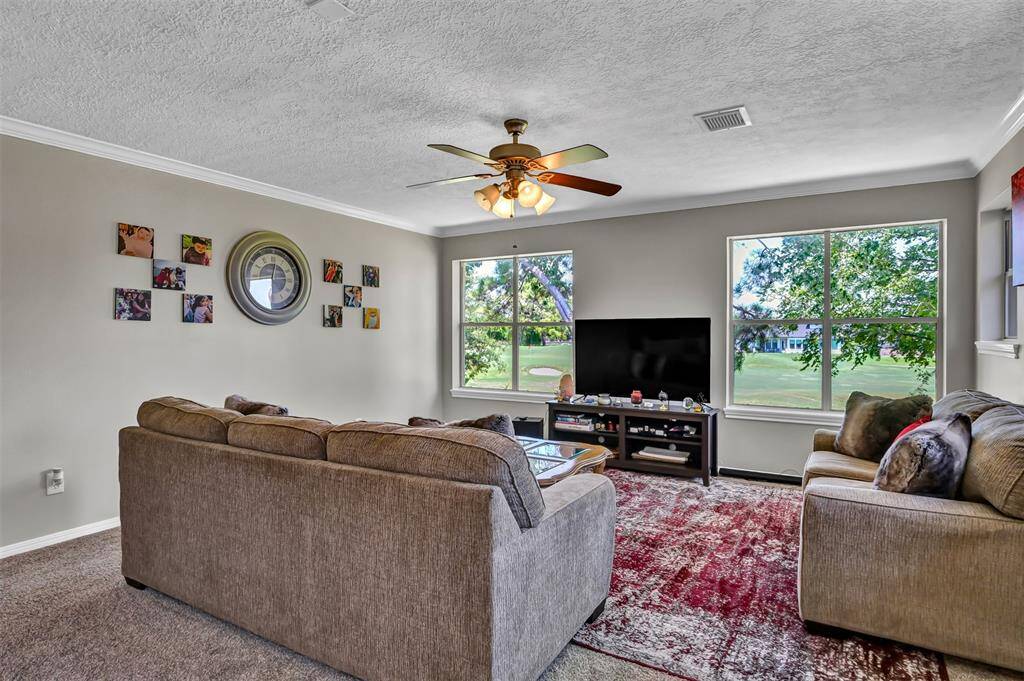 Huge upstairs gameroom with views of the golf course.