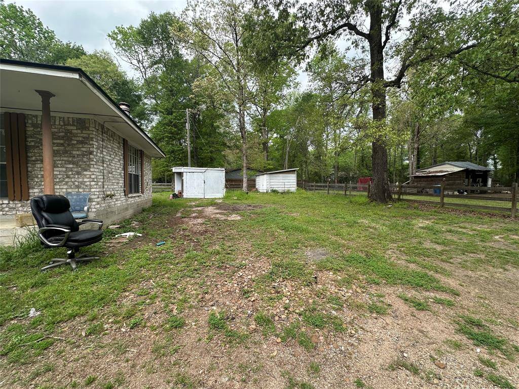 Home also has two storage sheds.