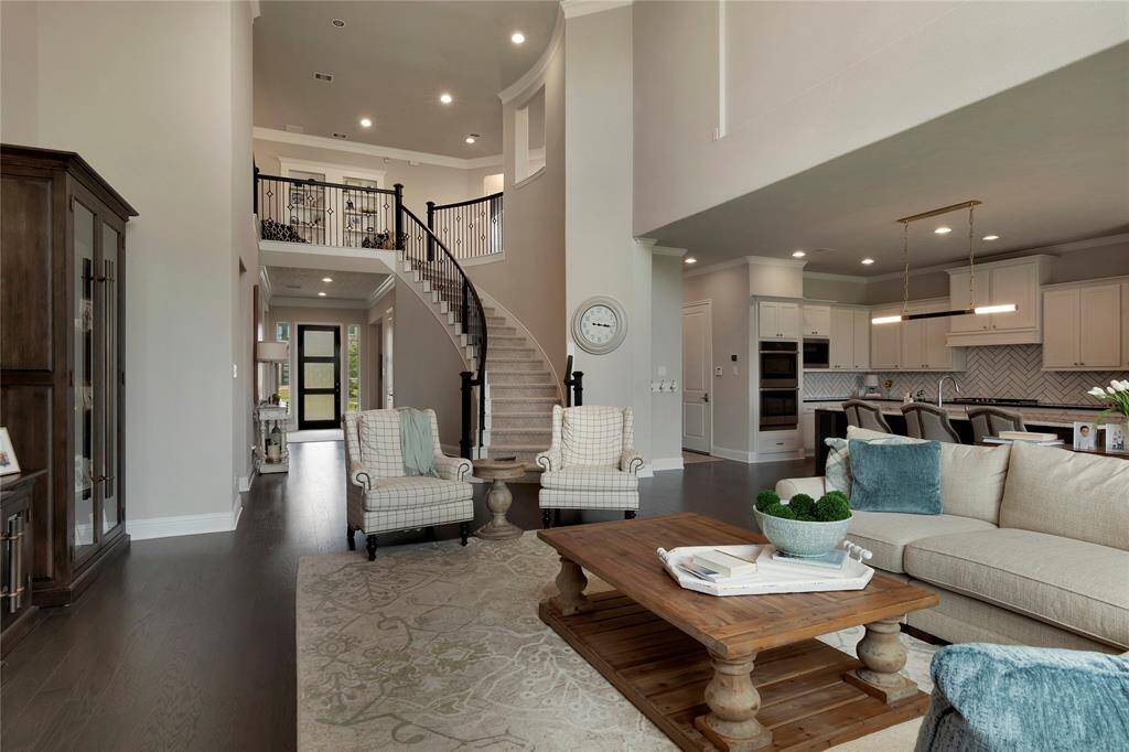 The arched stair railing adds the touch.
