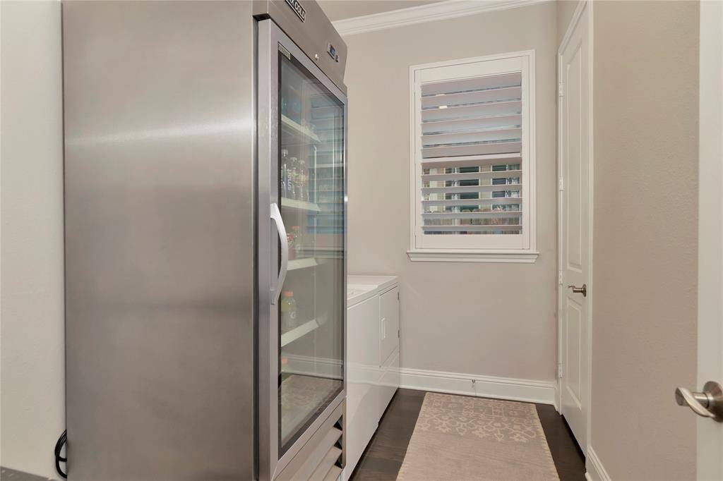 Great laundry room with a closet.