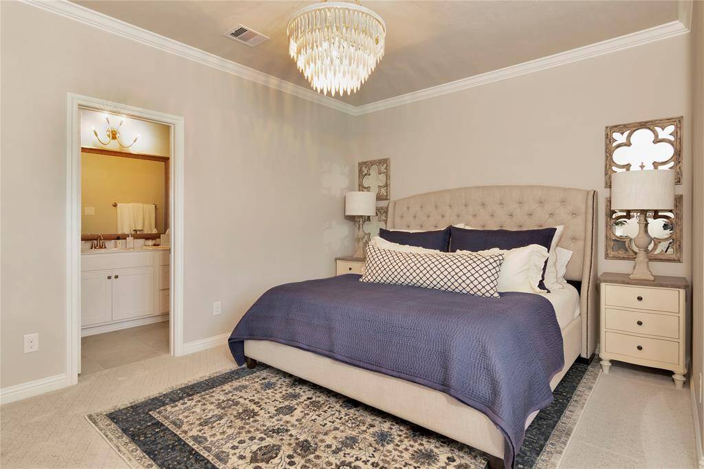 Fourth bedroom with beautiful fixture.