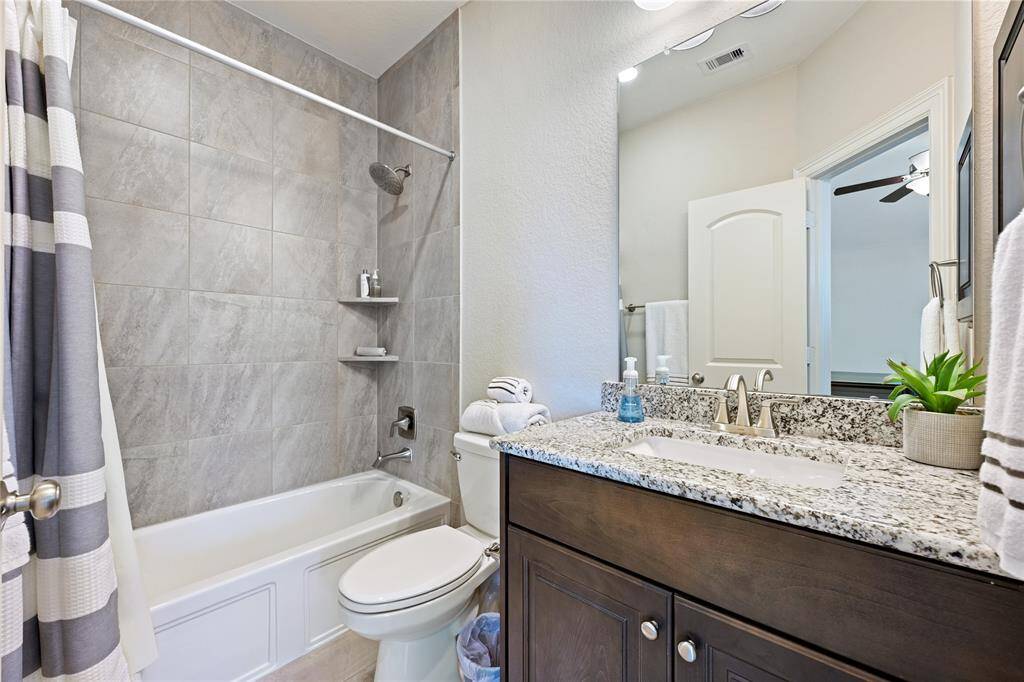 upstairs bathroom connected to the bedroom/gameroom