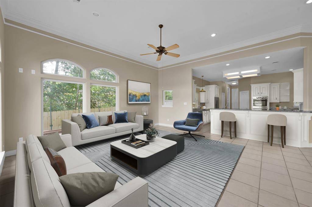 The living room with open floor plan allows for entertaining and easy living