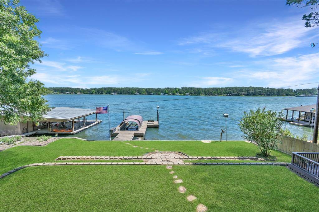 Massive backlash overlooking your private boat dock and Lake Conroe