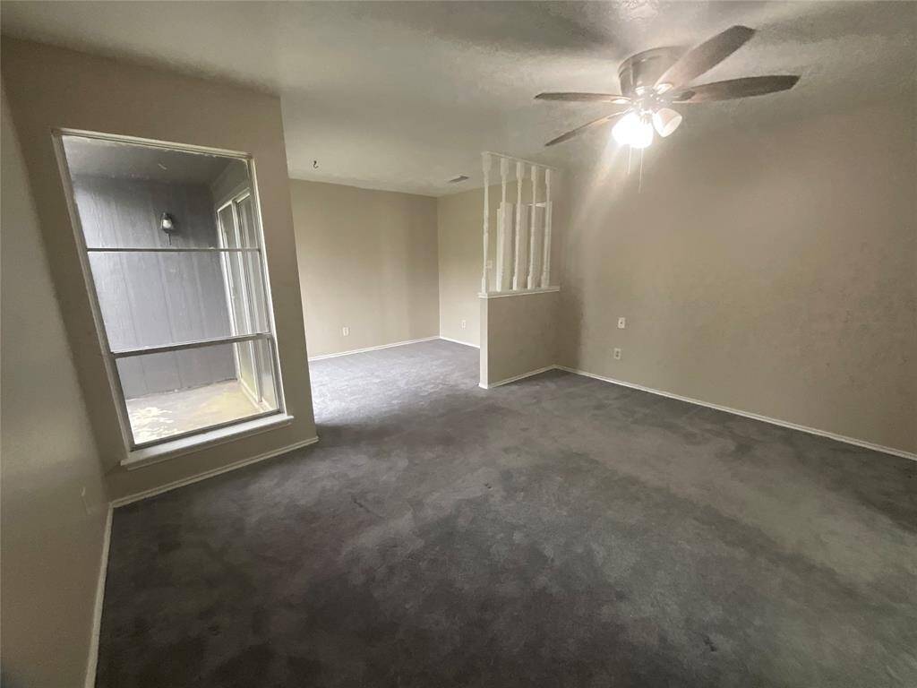 Spacious primary bedroom with direct access to your private patio.