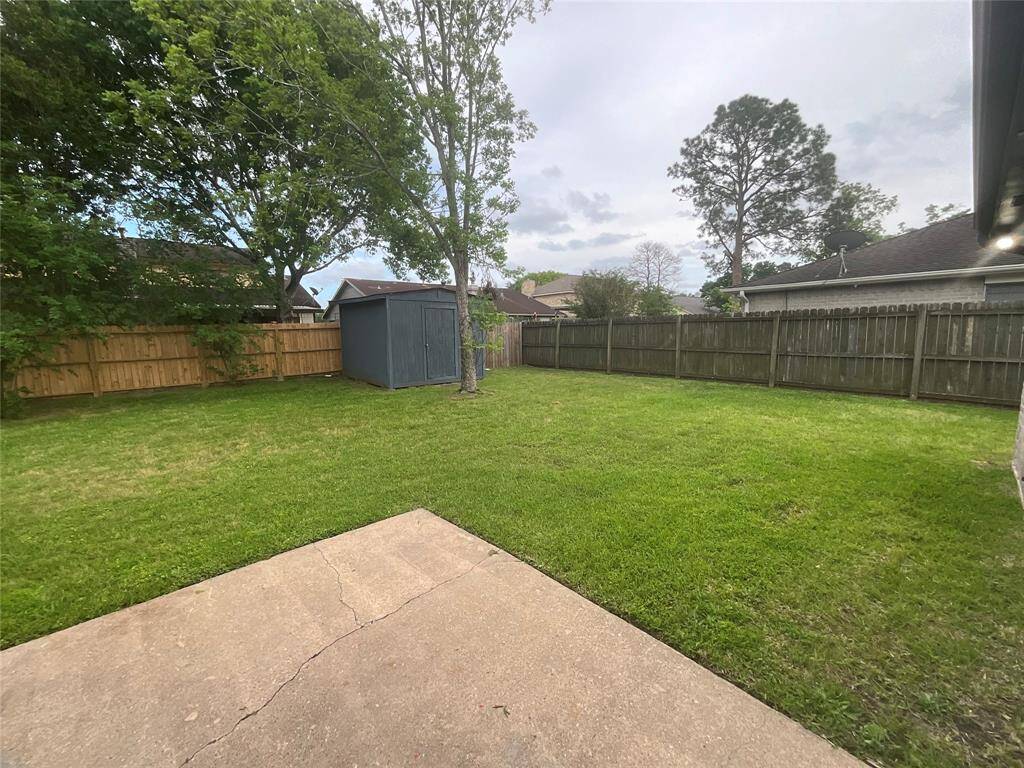 Expansive backyard perfect for outdoor activities and relaxation.