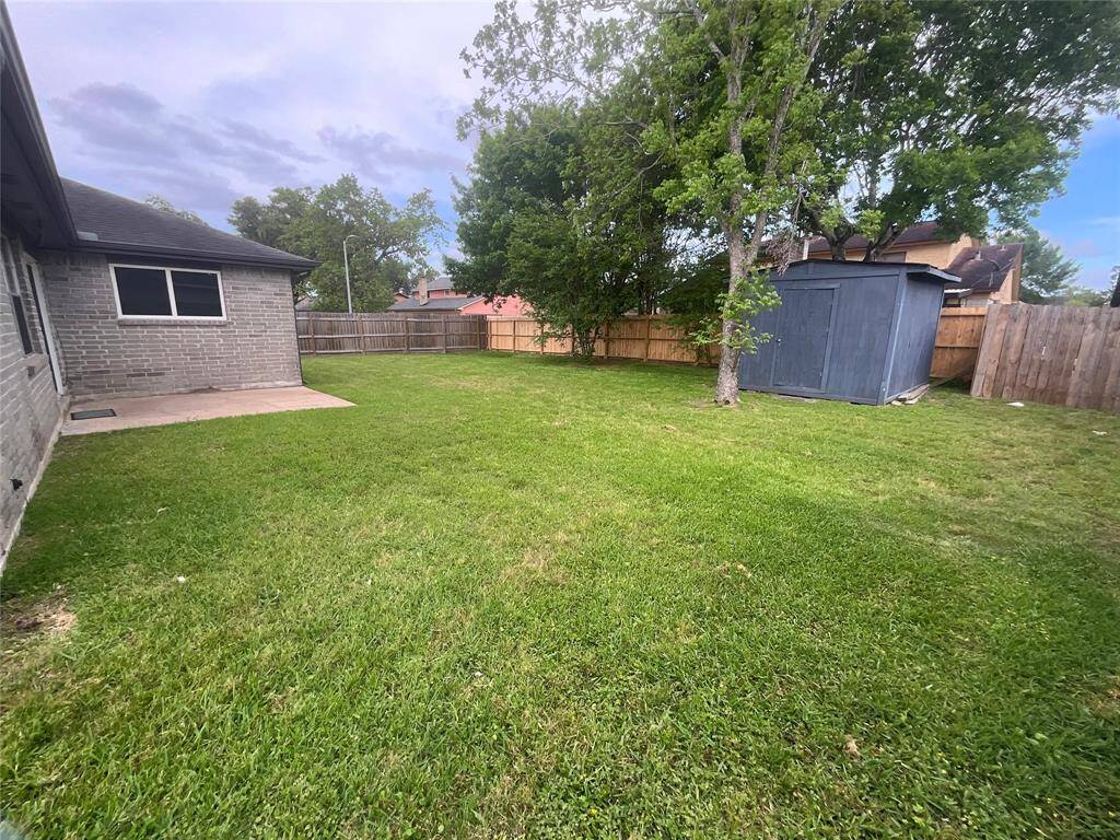 Expansive backyard perfect for outdoor activities and relaxation.