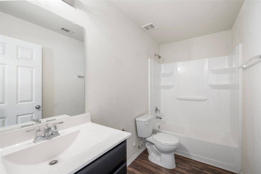 Auxiliary bathroom with stone countertop