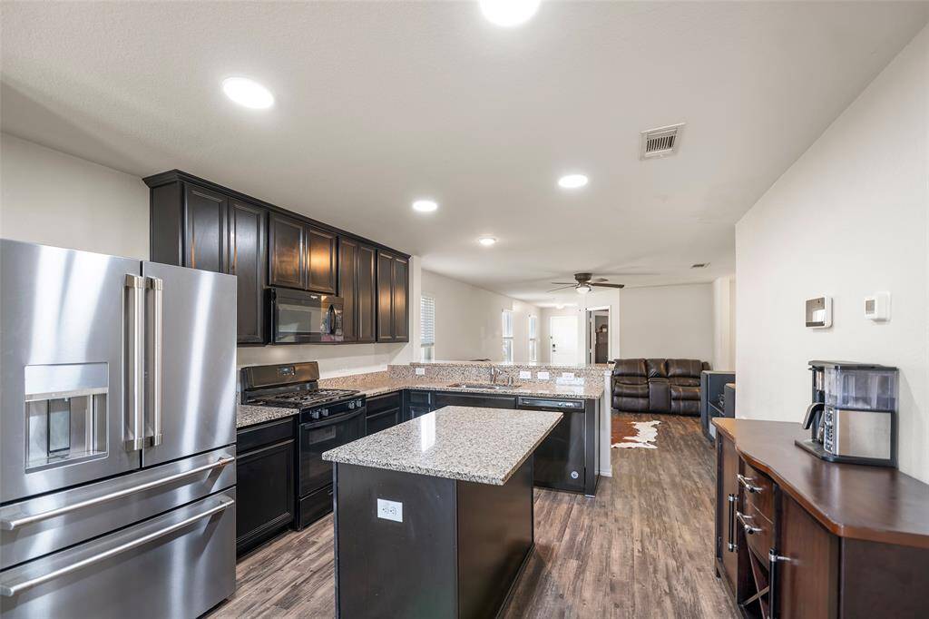 Granite countertops and wood cabinets