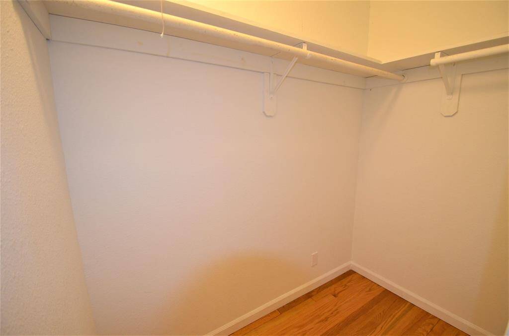 Spacious walk-in closets in master bedroom.