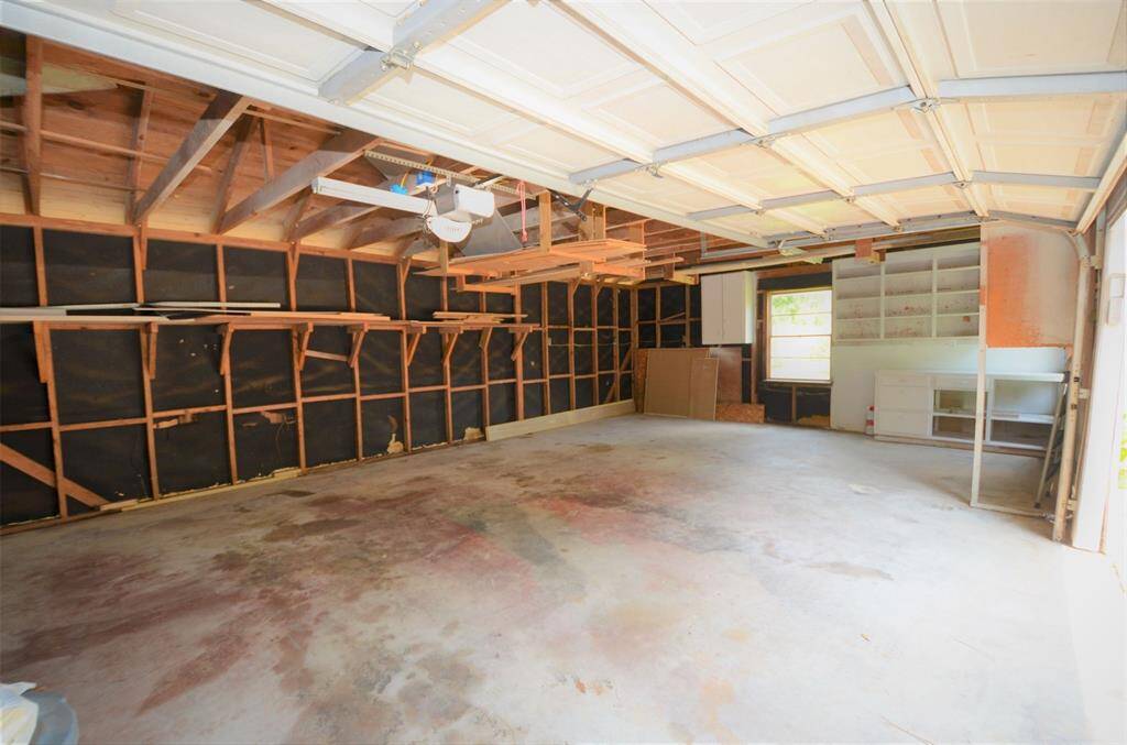 Rare Oversize Detached 2 car garage in this neighborhood! Additional workshop storage. Garage has windows, plenty light and automatic garage opener.
