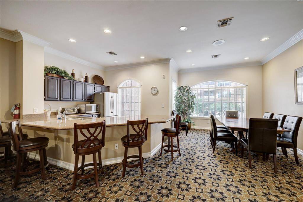 Club house party area includes a kitchen and dining room