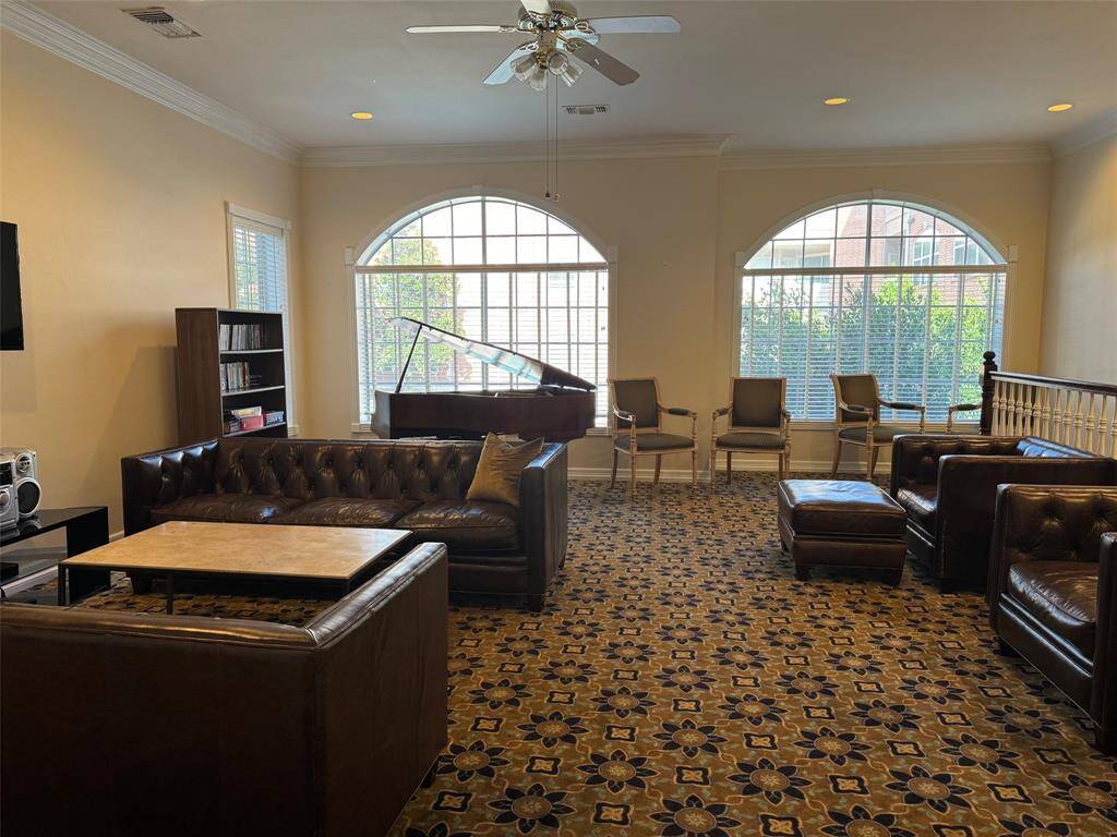 and living room with seating area, a piano and TV