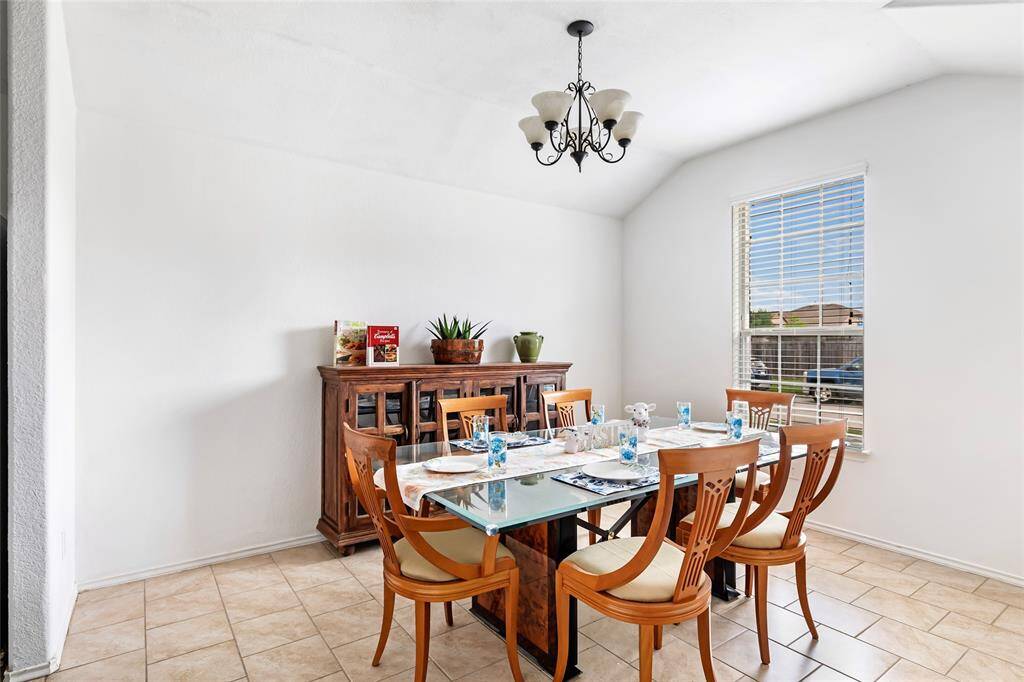 Lots of room for dinner parties, or this room can also be used as an office.