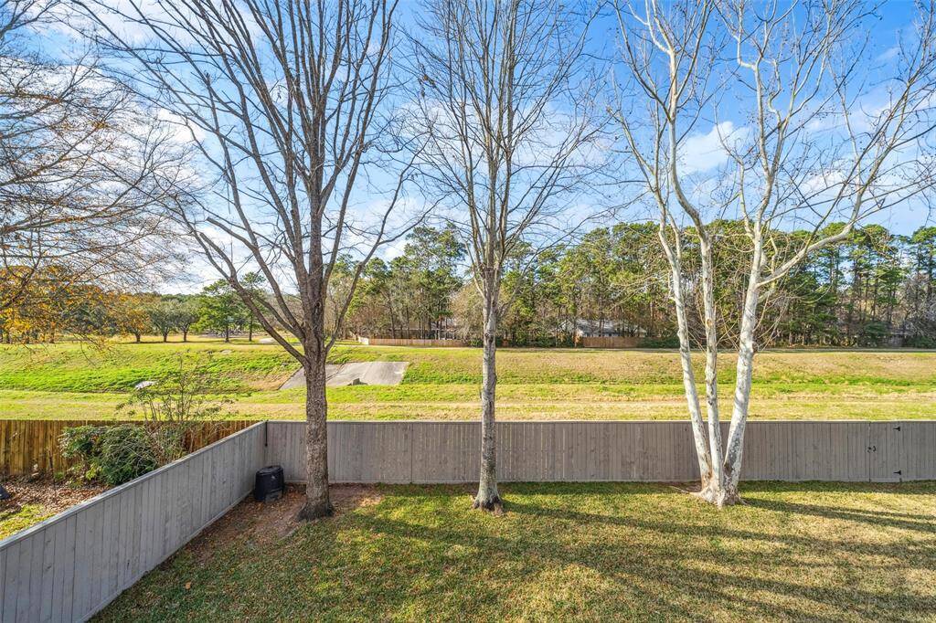 Nestled on a private GREENBELT lot.