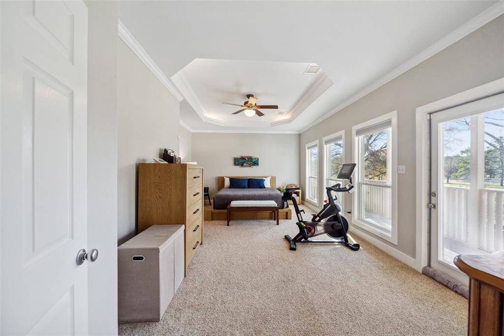The Primary Bedroom Suite up is large and overlooks the private view out back.