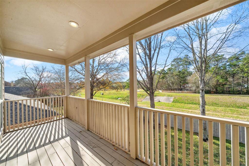 The Primary Suite is complete with this 2nd floor balcony to enjoy the peaceful view.