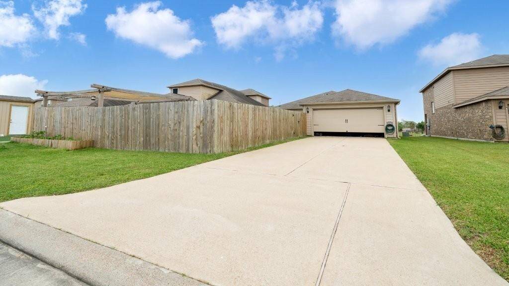 Oversized driveway in back of home!