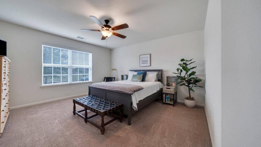 Primary bedroom with large windows!