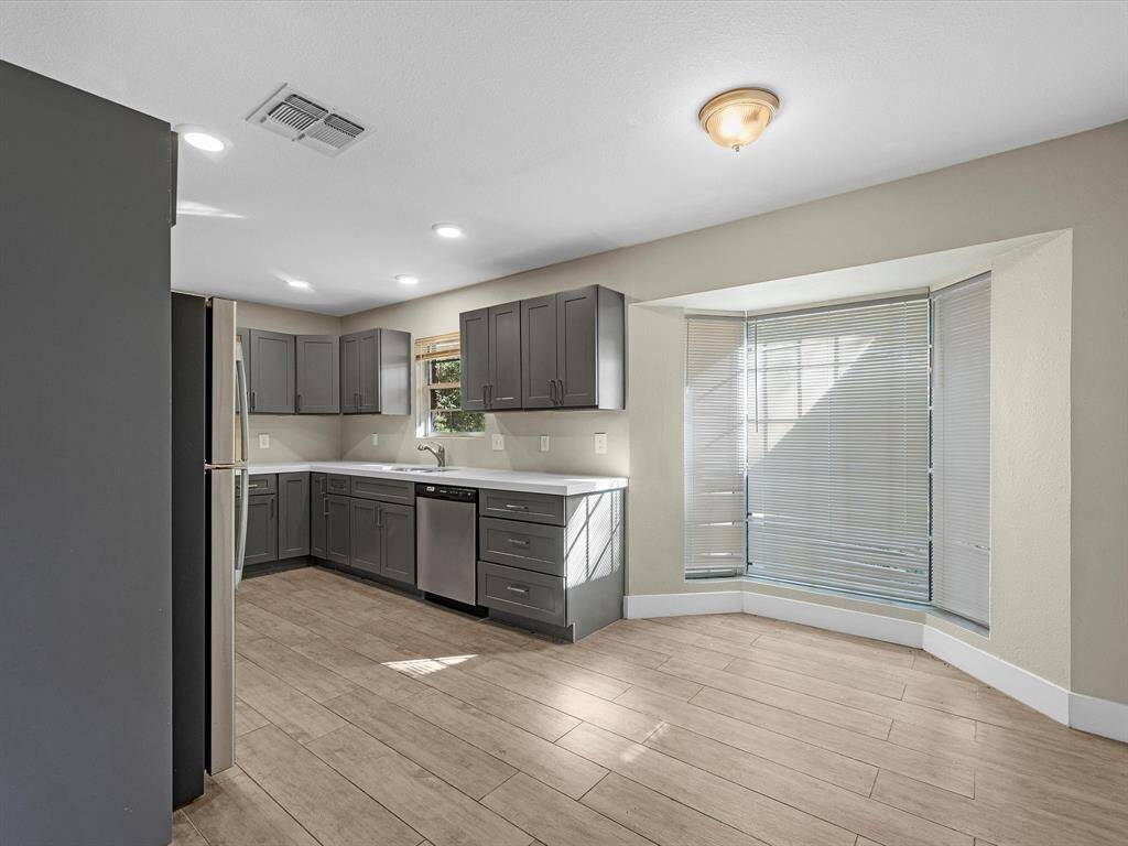 The kitchen includes a spacious breakfast nook.